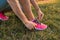 Female hiker or runner foot and sport shoes doing workout outdoors.