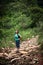 Female hiker on a rustic trail in Costa Rica