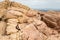 Female Hiker Sitting on a Mountain in the Desert