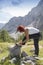 Female hiker tying boot laces