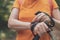 Female hiker using smart wristband during trekking in nature