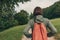 Female hiker walking on footpath outdoors