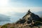 Female hikers on top of the mountain enjoying valley view