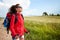 Female hiking woman happy and smiling during hike trek on Toscan