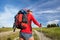 Female hiking woman happy and smiling during hike trek on Toscan