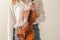 Female Holding Beautiful Full Sized Violin