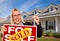 Female Holding Keys & Sold Real Estate Sign