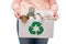 Female holding waste metal in recycling