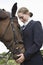 Female Horseback Rider With Horse