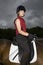 Female Horseback Rider Sitting On Horse