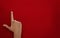 Female Indian Voter Hand with voting sign or ink on red background with copy space election commission of India