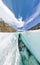 Female inside the crack in the ice glaciers Iceland. Wide-angle panorama