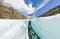 Female inside the crack in the ice glaciers Iceland. Wide-angle panorama