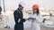 Female inspector signing document after boat inspection