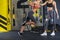 Female instructor is holding crossfit for girl