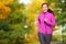 Female jogger - young woman jogging in the park