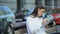 Female journalist making notes and talking phone, preparing for reportage