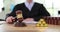 Female judge knocking wooden gavel at table in court
