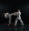 Female karate fighter on training with male master