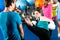 Female kick boxer with trainer in sparring