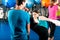 Female kick boxer with trainer in sparring