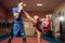 Female kickboxer with male personal trainer