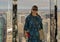 Female Korean tourist posing in the immersive art experience of SUMMIT One Vanderbilt in New York City.