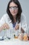 Female Laboratory Staff Dealing with Color Chemicals in Lab