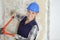 Female labourer using bolt croppers