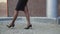 Female legs in tights walks in the shoes with long heels 4K