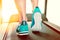 Female legs in turquoise sneakers on a treadmill.