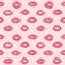 Female lips hearts seamless pattern