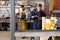 Female locksmith working in metalworking workshop