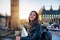 Female London traveler enjoys the view next to the Big Ben clocktower