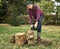 Female lumberjack holding a chainsaw