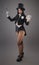 Female magician in performer suit with magic wand and playing ca