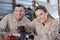 Female and male metalwork workers training in workshop