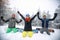 Female with male snowboarders kneeling on snow