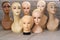 Female mannequin heads with makeup without hair. Delivery of goods for purchases during the coronavirus. Shop of commercial