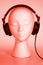 Female Mannequin listening to Music