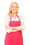 A female manual worker wearing an apron and posing