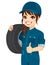 Female Mechanic Holding Tire Wheel