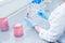 Female medical or scientific laboratory researcher performs tests. Close up, selective focus