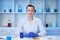 A female medical scientist works in a laboratory. Spcialist conducts experiments, develops auccin auctin from the virus