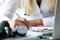 Female medicine doctor hand holding silver pen