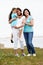 Female Members Of Multi Generation Family Standing By Sea