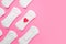 Female menstrual pads on pink background, woman\\\'s health, woman\\\'s periods cycle concept, copy space