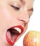 Female model biting an apple