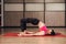 Female Model doing Yoga Bridge Pose at gym, Upward Bow or Wheel Posture