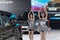 Female models dancing at kia car booth